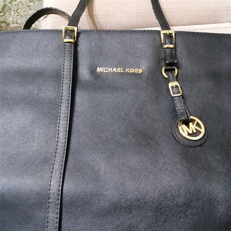 michael kors çakma çanta|Michael Kors toka.